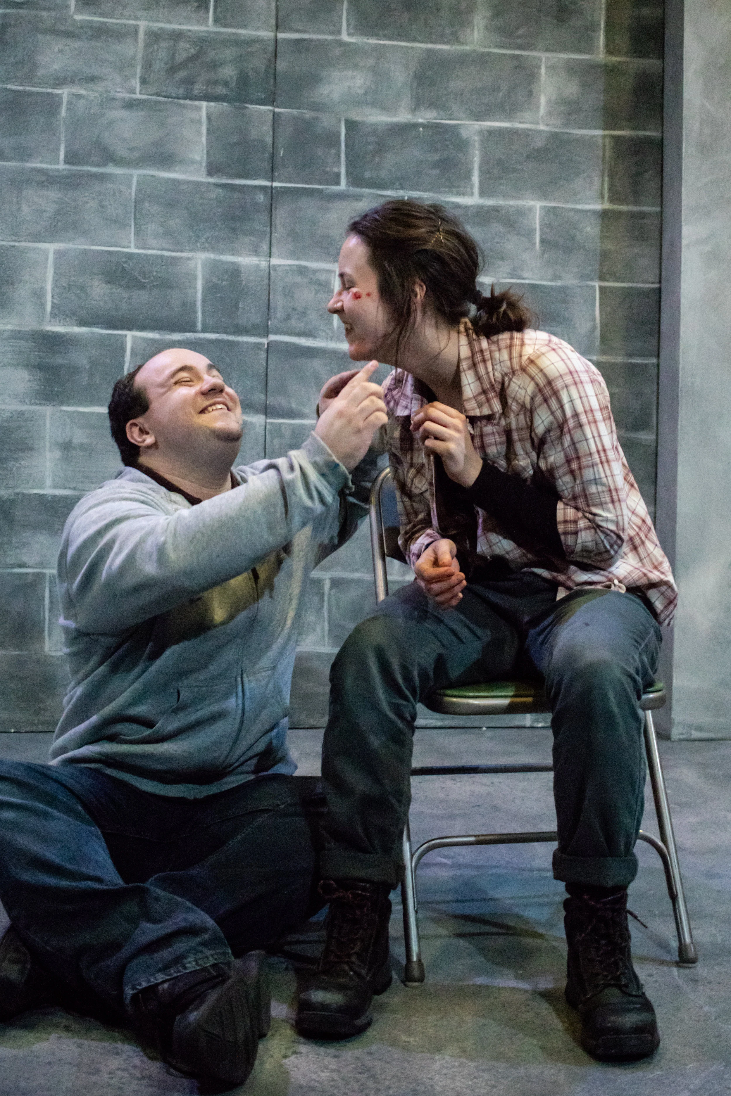 Logan Milway as Michal and Rose Grizzell as Katurian in The Constructivists' production of “The Pillowman,” by Martin McDonagh, Directed by Jaimelyn Gray. Photos by Christal Wagner Photography. October 26 – November 10, 2018 at The Underground Collaborative, 161 W. Wisconsin Ave, Milwaukee, Wisconsin.
