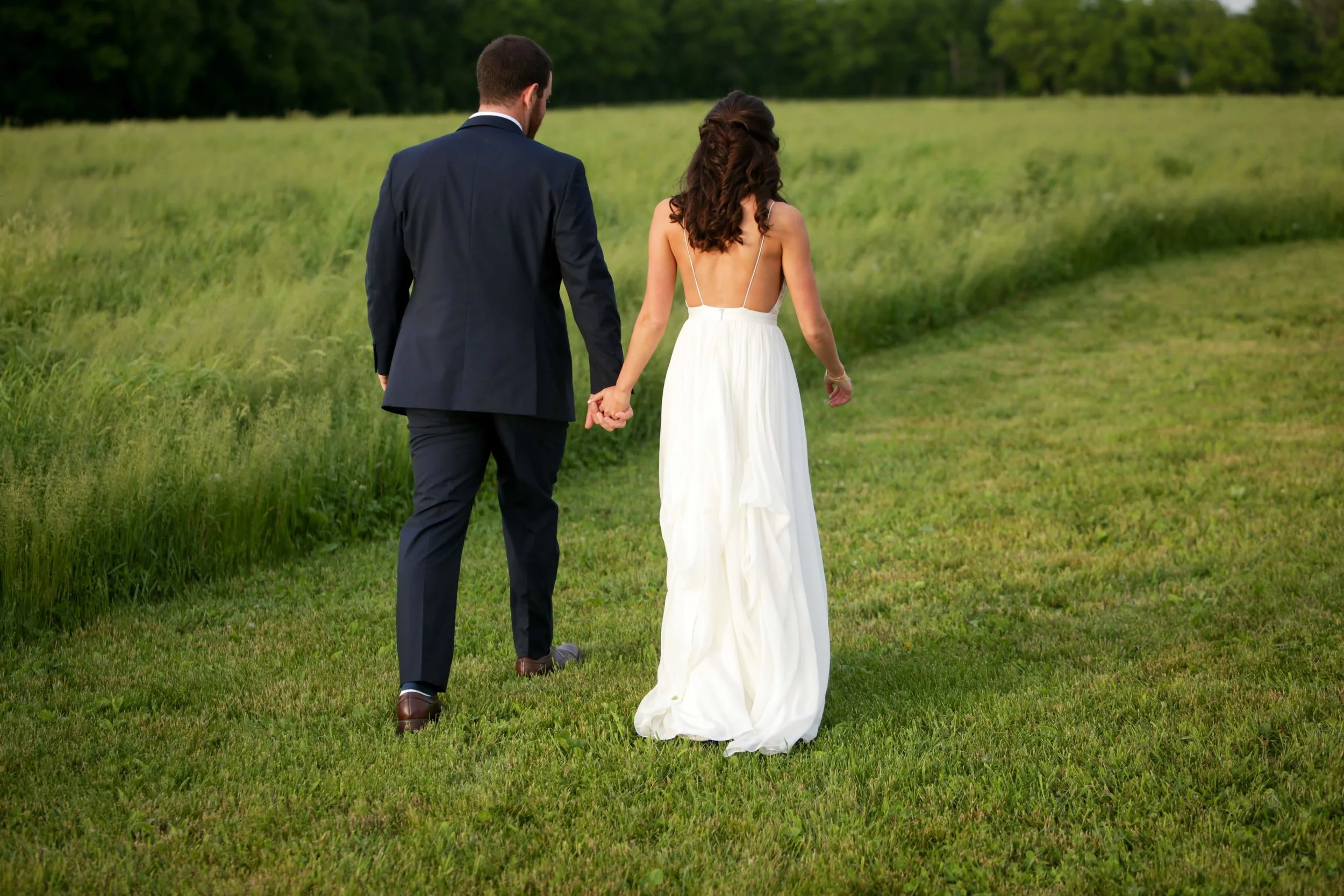 Couple walking in the field