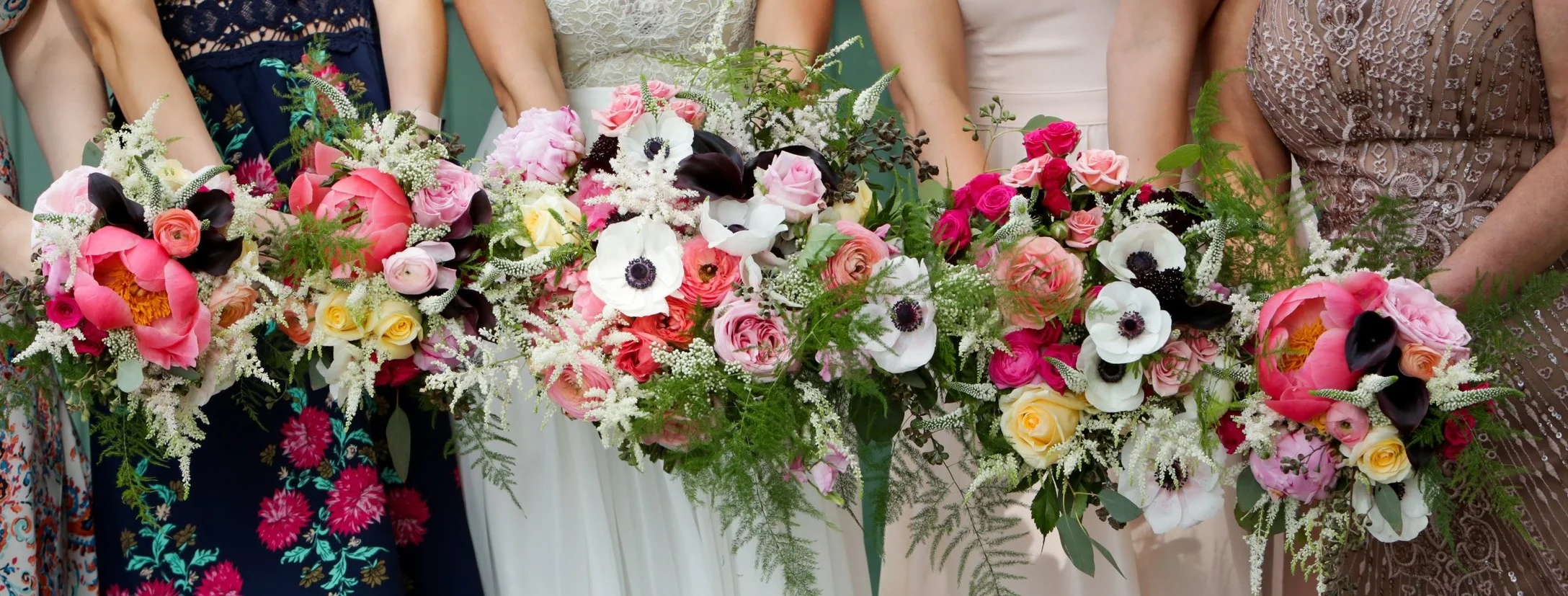 Bridal party holding bouquets
