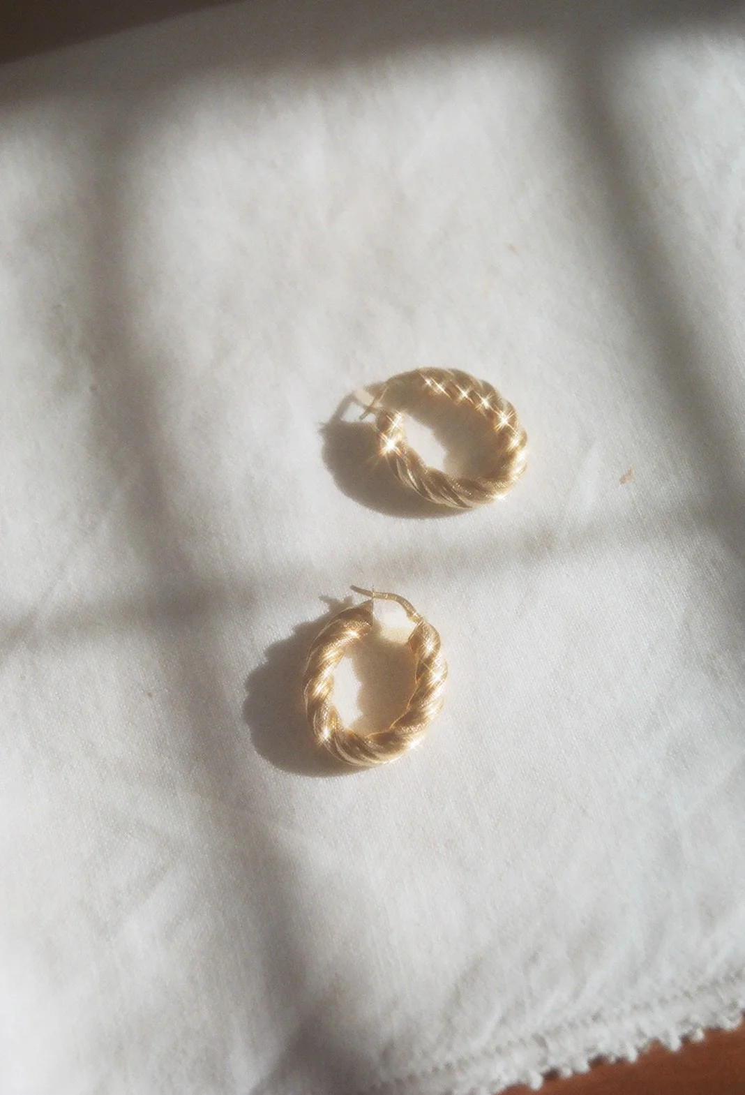 14k twist hoops 2.jpg