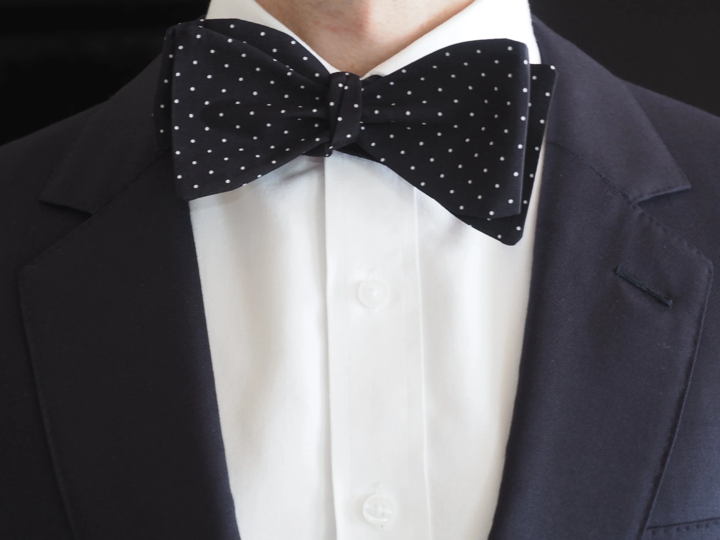 Black and white poka dot silk bow tie