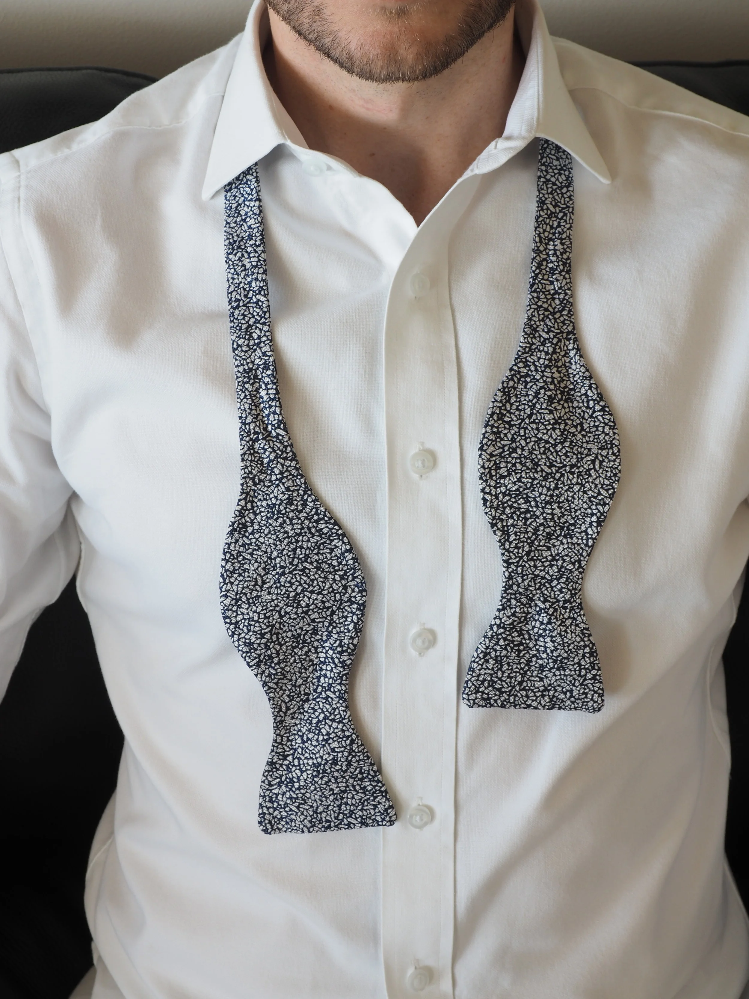 Blue and white silk bow tie