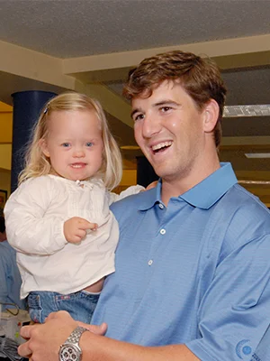 New York Giants and former Ole Miss quarterback Eli Manning holds Aubrey during a 2008 visit to Batson Children’s Hospital.