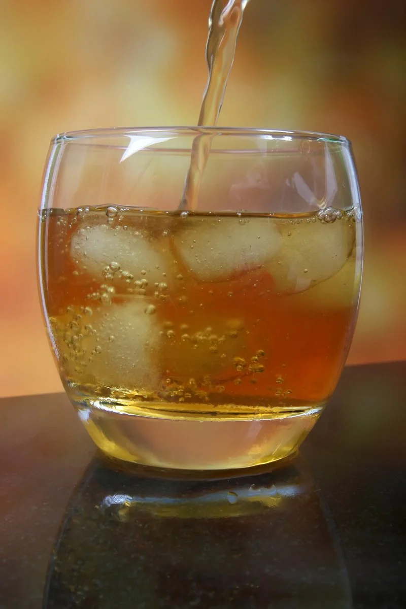 glass-at-a-party-a-cocktail-with-alcohol-or-juice-1632191.jpg