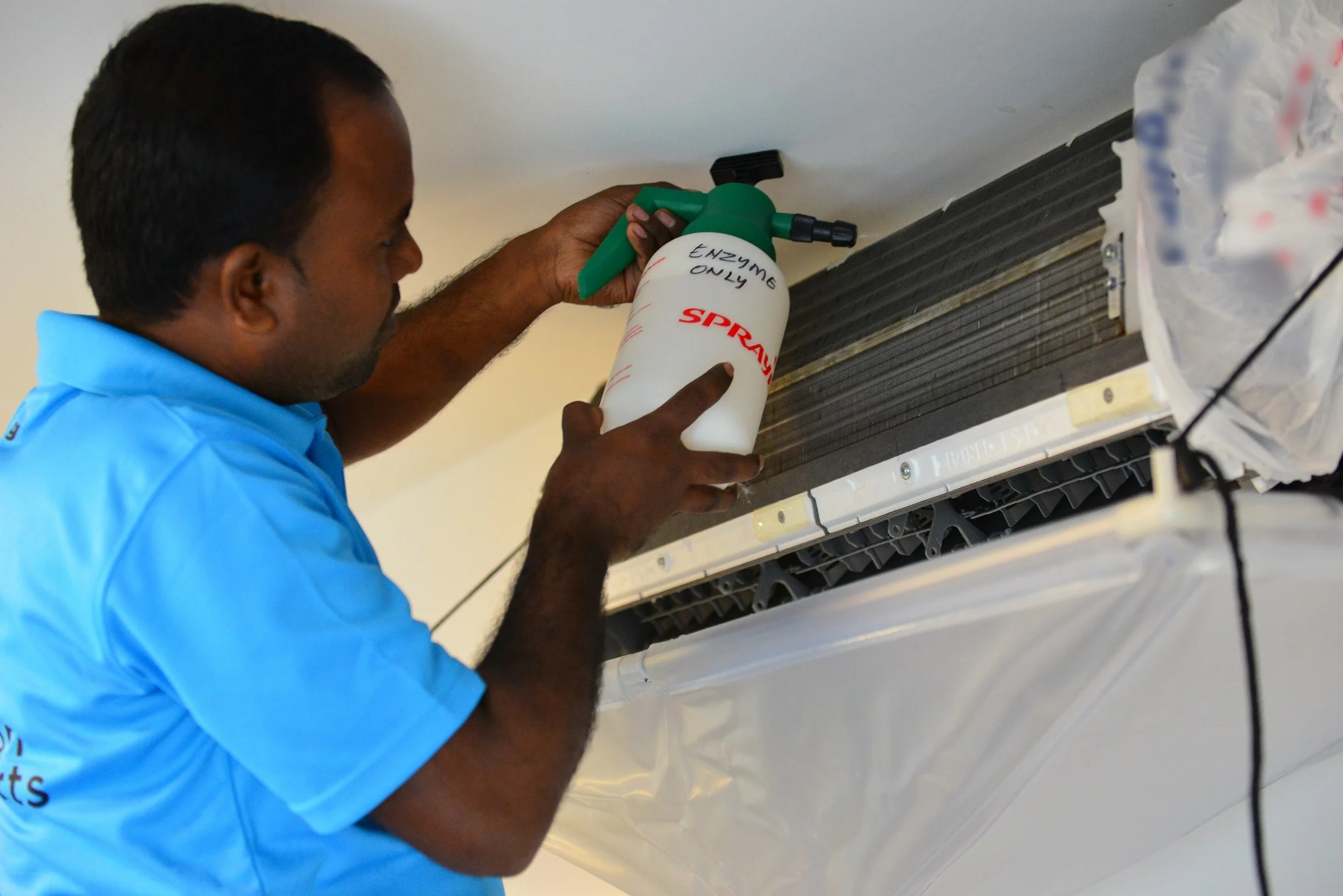 Enzyme liquid application on coils to remove impurities requires low pressure spray to avoid damaging coil fins. 