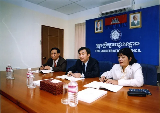 A meeting at the Cambodian Arbitration Council ; Photo credit: International Labor Organization ; CC BY-NC-ND 2.0 (not to be confused with the National Commercial Arbitration Center )