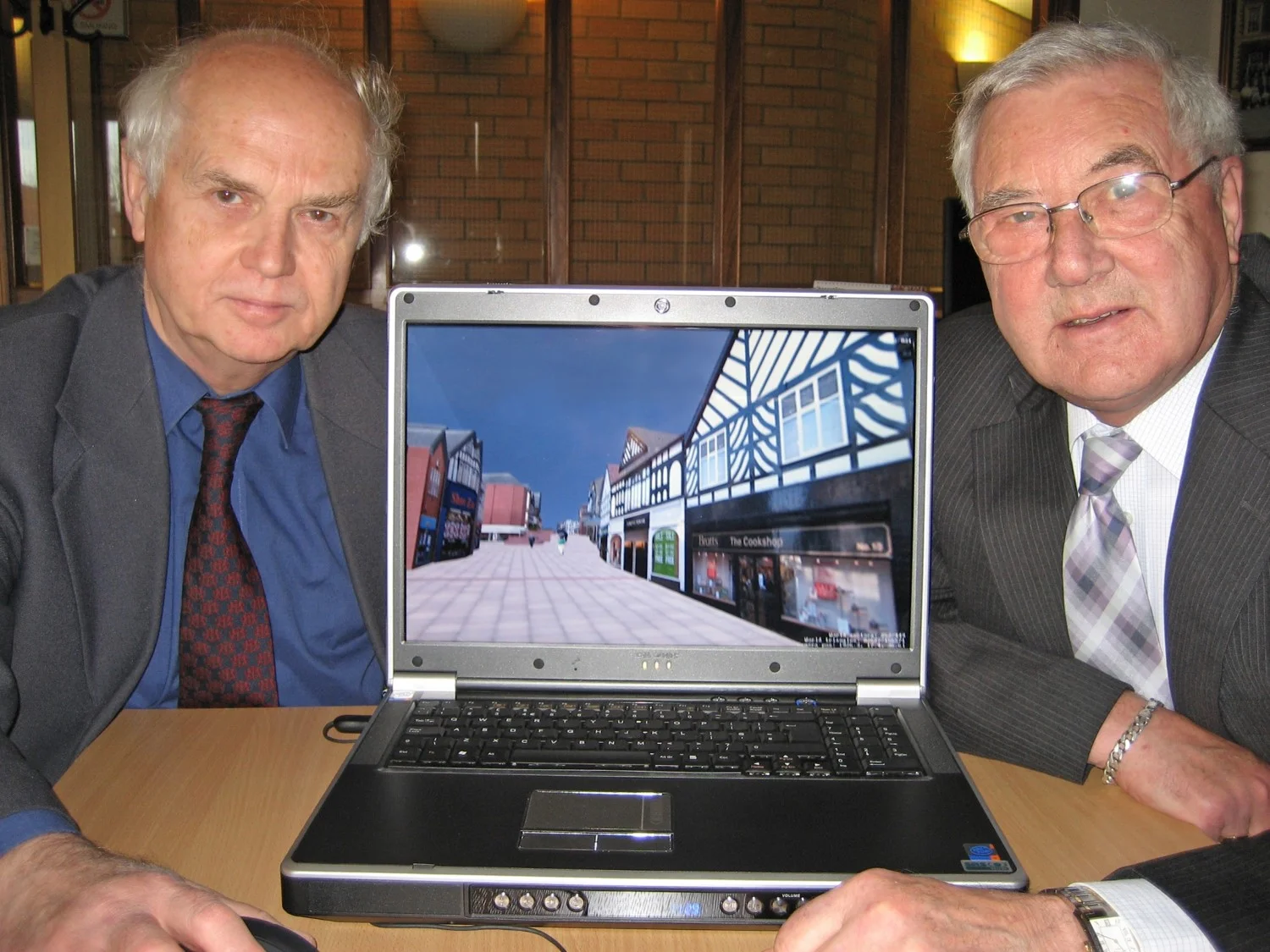 Northwich councilors in 2006 with their 3D laptop enabling them to walk around the virtual reality model of Norwich which was being used as part of their flood alleviation strategy and planning process.
