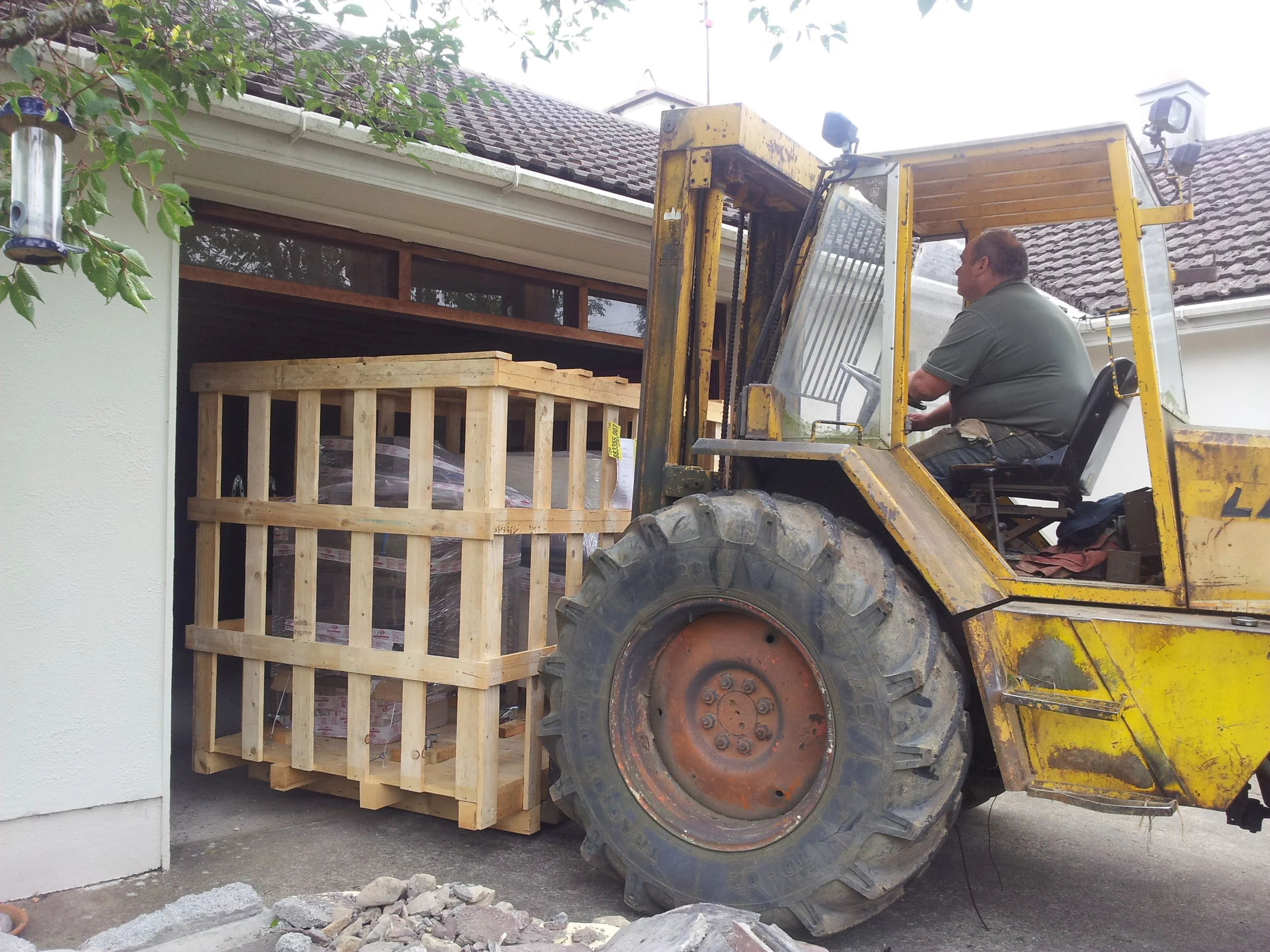 In 2013, with the support from my darling husband, Wicklow LEO, and MFI Ireland, I converted our garage into a purpose-built Nougat Kitchen. In this photo Joe (our neighbour) brings the pallet containing my new machines into a building site A.K.A - Nougat Kitchen.
