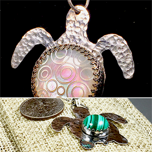 Sterling silver, hand textured turtle with a beautiful Mother of Pearl cabochon.