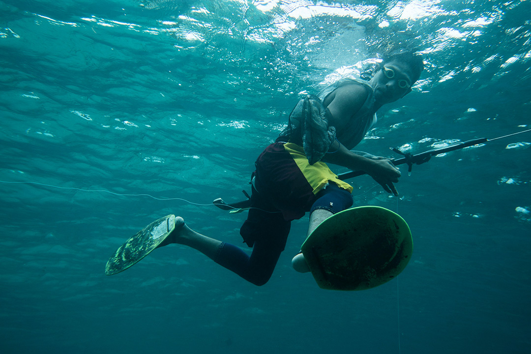 Local diving with homemade fins and goggles.