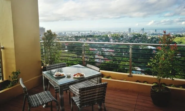 Outside the box ... balcony living. Photograph: Timothy Mcgee/Getty Images/EyeEm