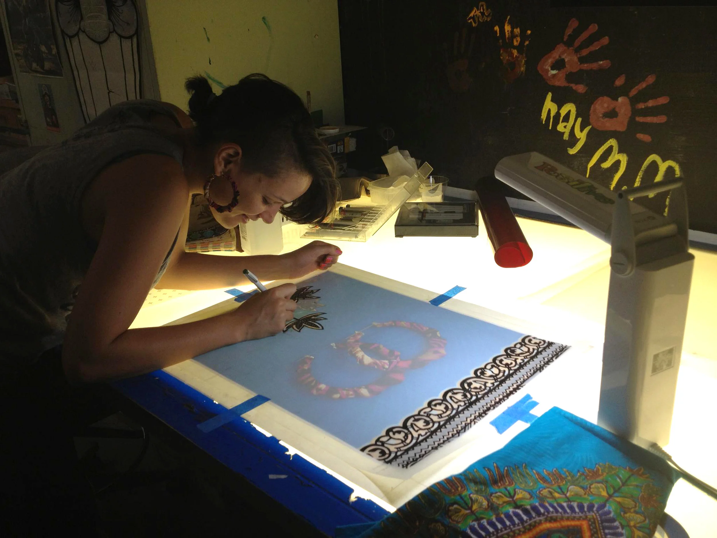 Tanya "NenaSoulFly" Melendez creating film positives, 2012