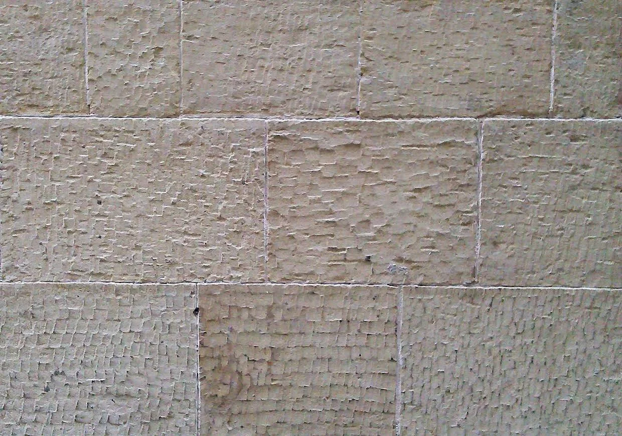 Stone masons’ chisel marks