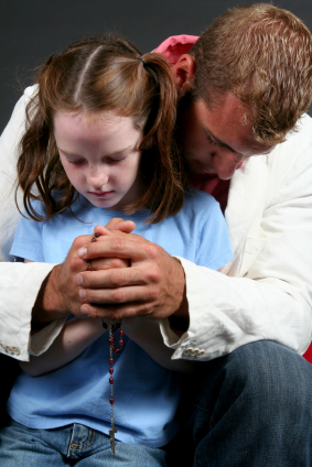 Father and Daughter Praying the Rosary.jpg