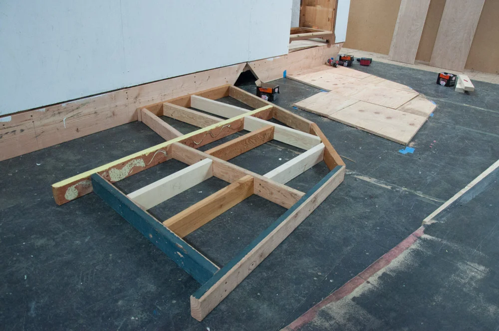 Exit vestibule flooring in progress.