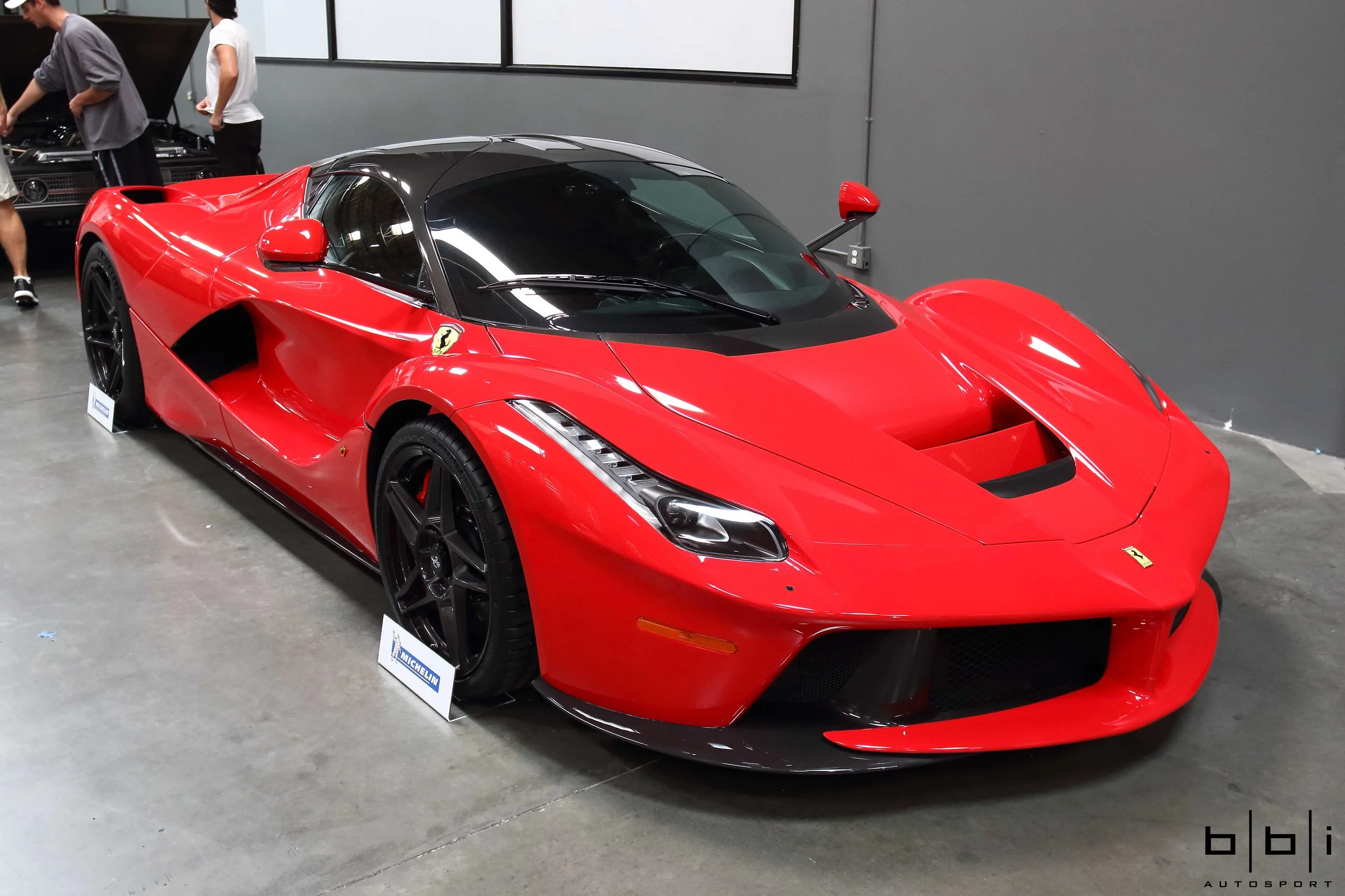 LaFerrari hypercar. First production car powered by the F1-derived HY-KERS hybrid drivetrain, it combines a 161-hp electric motor with the most powerful Ferrari V12, itself making 788 hp at 9000 rpm, for a power sum of 949 hp and 663 lb-ft of tq.