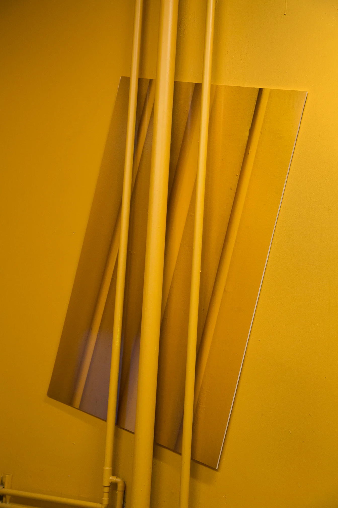 Manipulate a space, photograph, hang those images and rephotograph them to show the space with its own reflections. The space becomes its own subject matter, along with my time spent shooting and installing the work. This project is focused on memory, the passage of time, personal reflection and physical reflection of objects and images inhabiting a space. The documentation of the changing space is the subject of the final presentation.