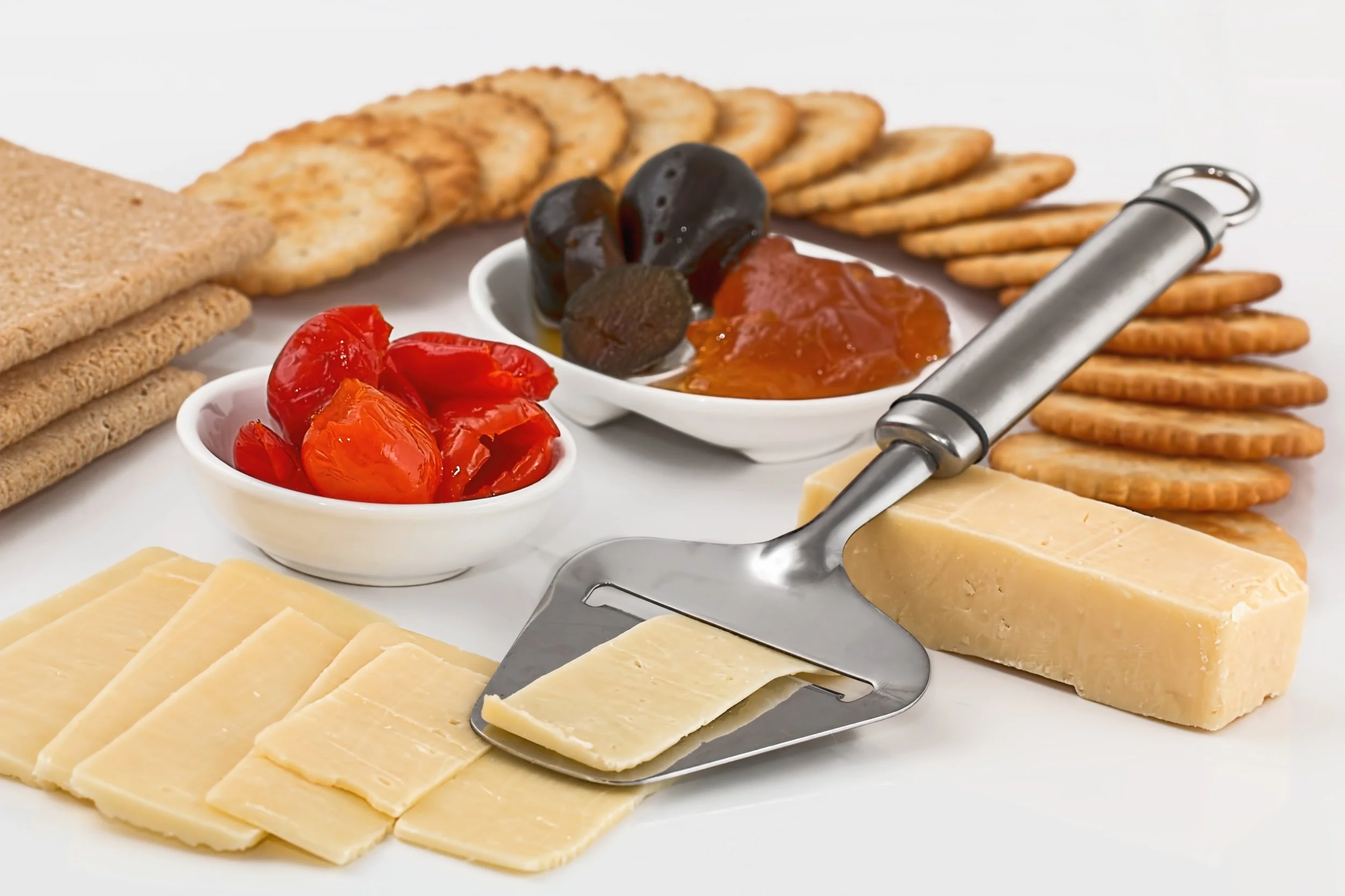 cheese-slicer-crackers-appetizers-dairy-product-37922.jpeg
