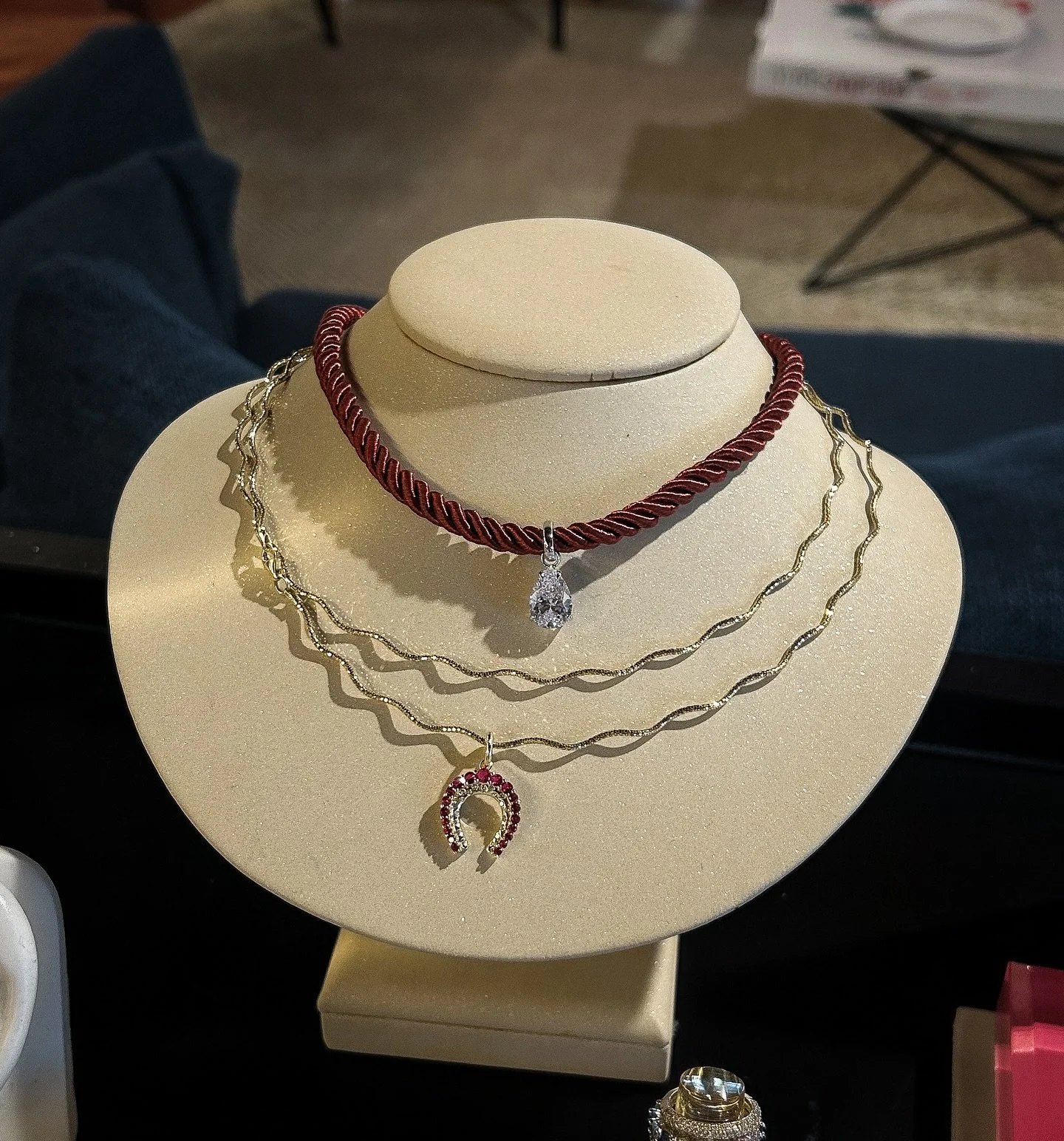 Layered to perfection: silky satin, golden waves, and just the right hint of ruby luck. A stack that&rsquo;s pure effortless elegance. ✨💫

Red satin cord white sapphires pear charm. Gold wave chains. Ruby horseshoe charm. 

#cfinejewelry #jewelryins