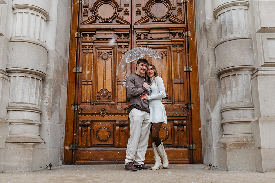 Couple standing in front of door at Indiana Statehouse during couple photo session