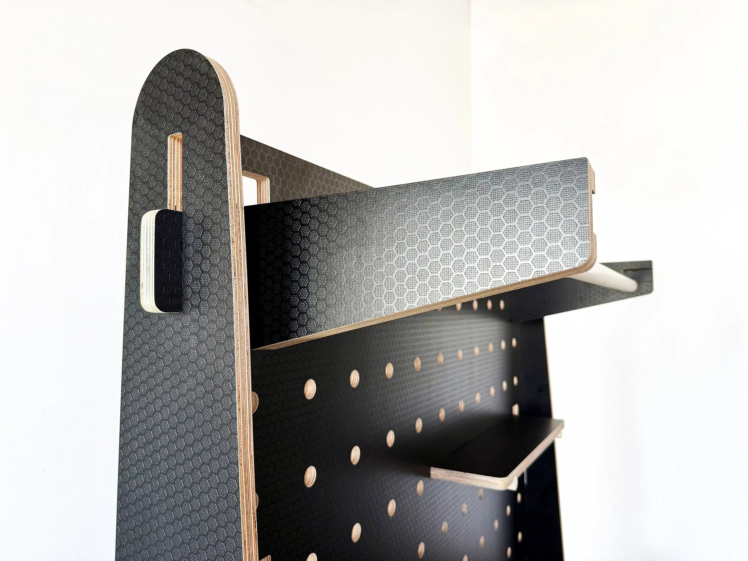black-floorstanding-pegboard-with-clothing-rack
