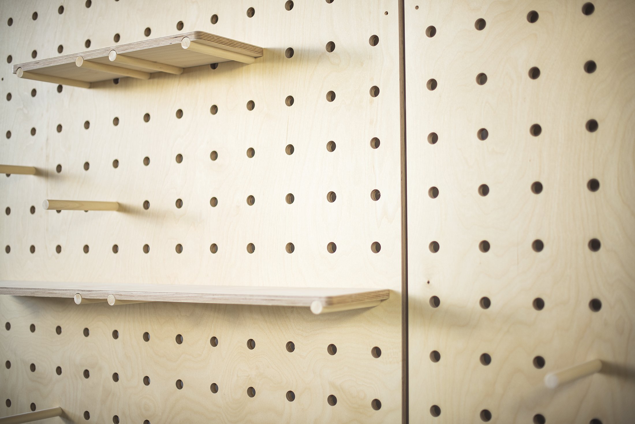 retail pegboard wall with shelves vancover