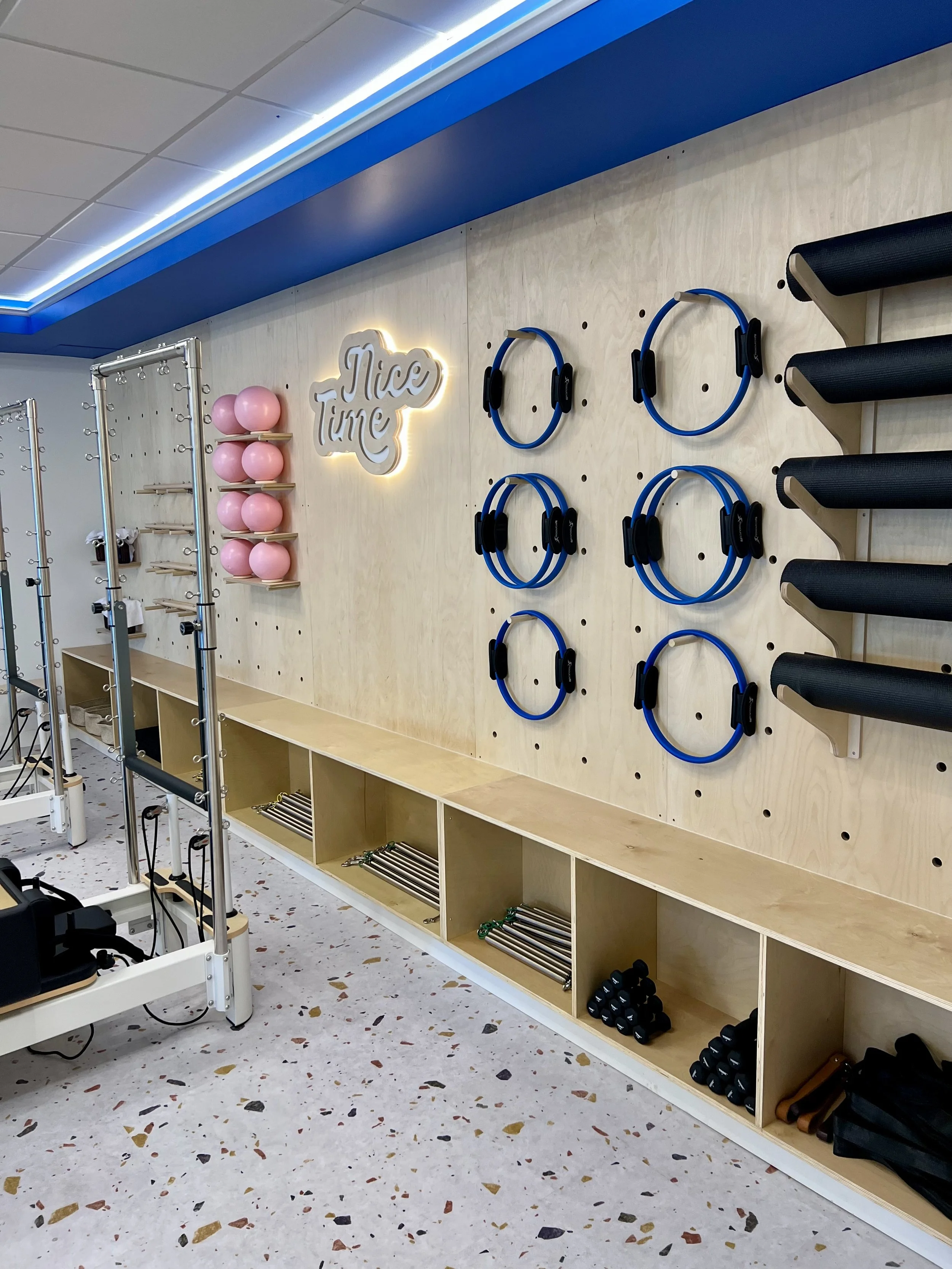 Custom Pegboard Feature Wall for Nice Time Pilates