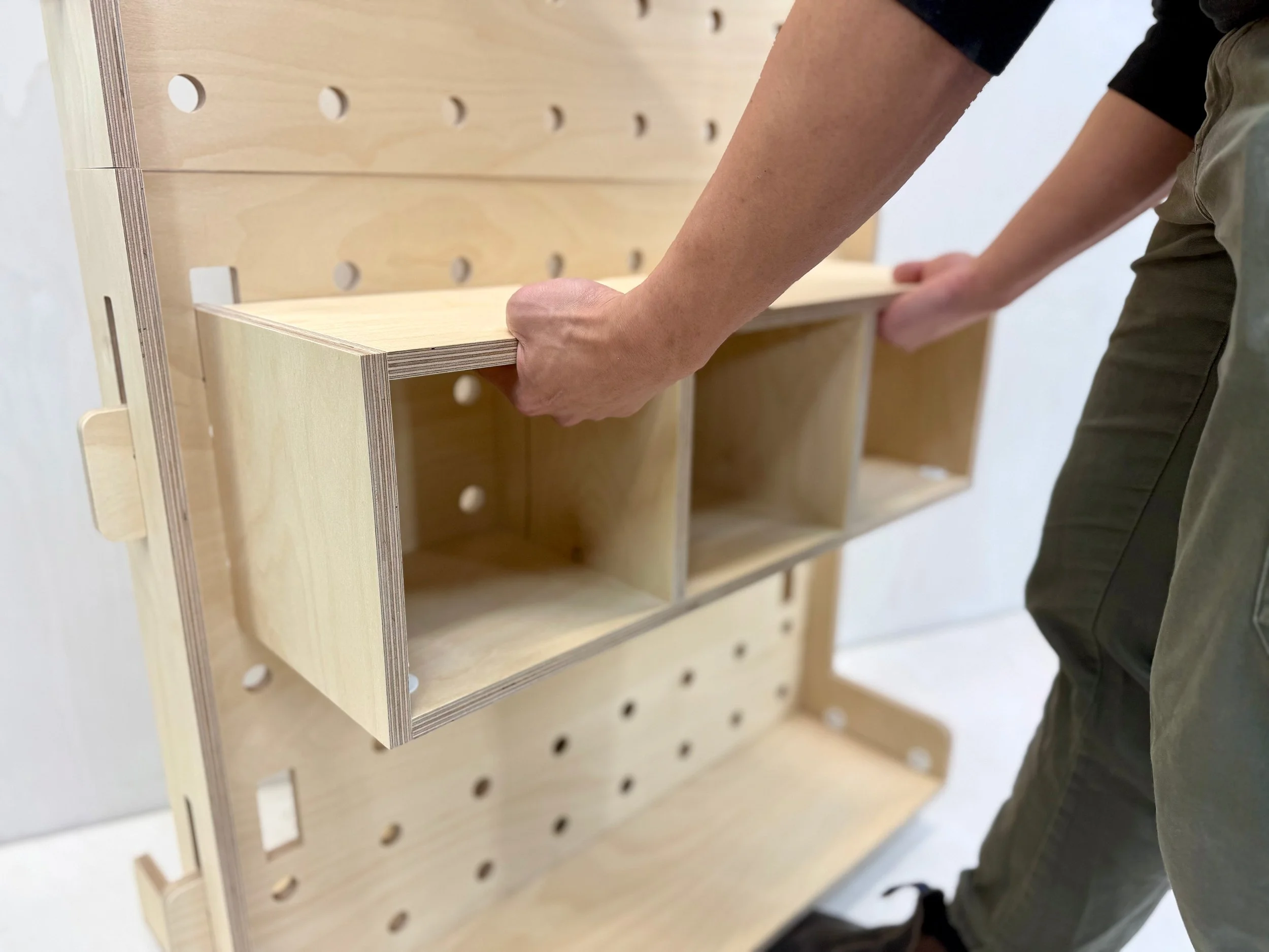 wood pegboard with removable storage cubby (Copy)