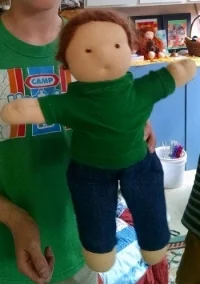 student with doll.jpg