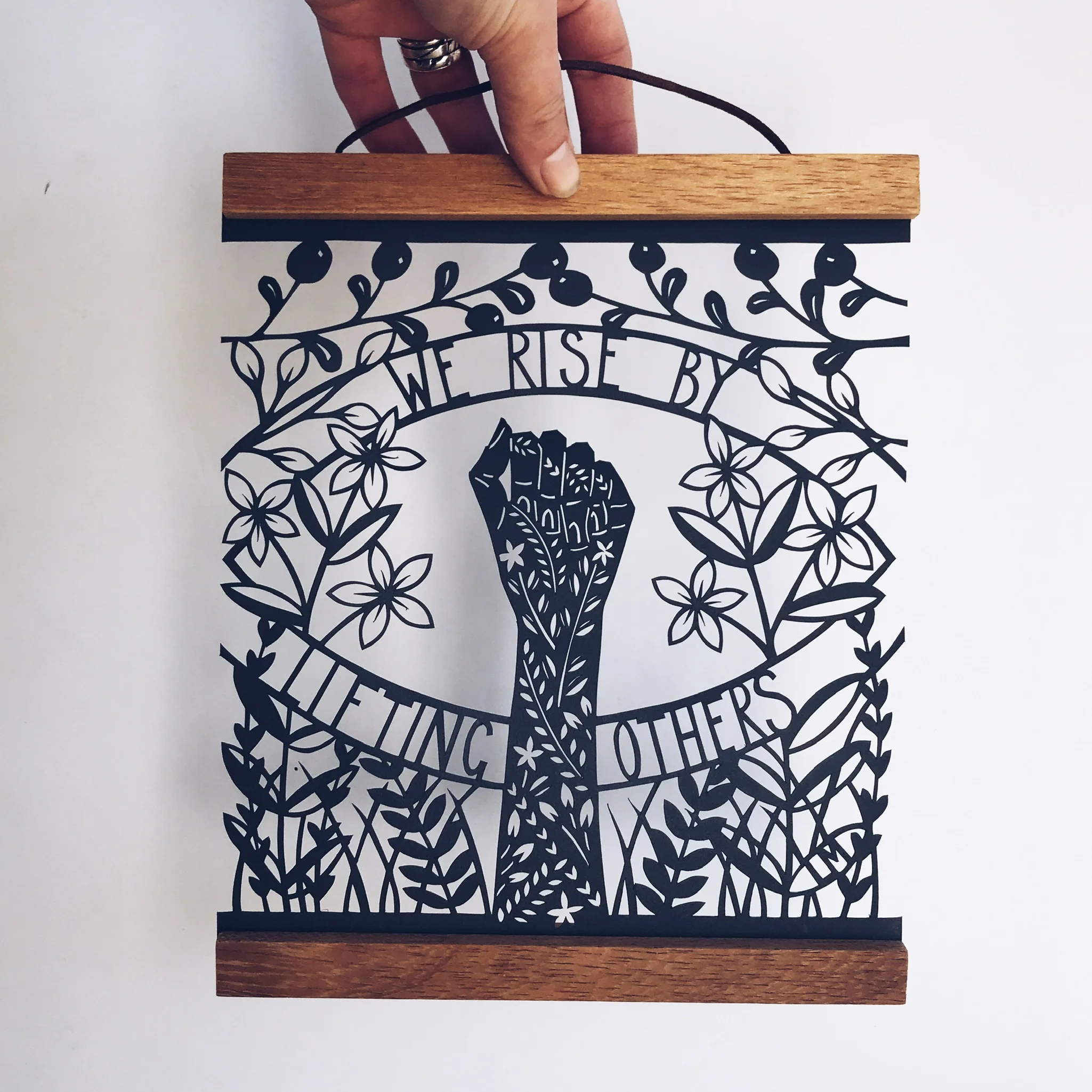 We Rise By Lifting Others