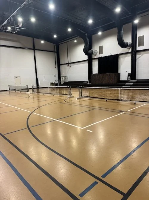 Gym with pickleball set up