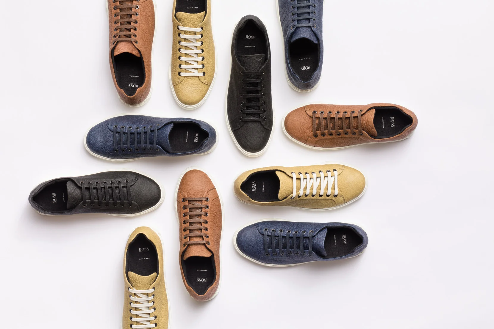 May 2018 – HUGO BOSS launches a new BOSS Menswear shoe produced with Piñatex, a natural-based material made of pineapple leaf fibers by Ananas Anam. The project is part of the commitment to innovation across the Company’s offering as well as the continuous search for more sustainable ways to design, source and produce. Harvested as a by-product of existing agriculture, the pineapple leaves require no extra resources to grow, furthermore providing farming communities with an additional income. The textile is colored using natural plant-based dyes. In combination with a recycled TPU sole, the shoe is 100% vegan and designed to make a minimal impact on our planet. Available in four colors, the vegan shoes are presented in a fully recyclable and biodegradable paper box, made from 100% recovered fibers and are sold in selected BOSS retail stores worldwide as well as in the HUGO BOSS online store .