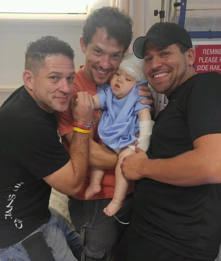 Daddy and her Tios visit Miss A in the hospital, July 2016