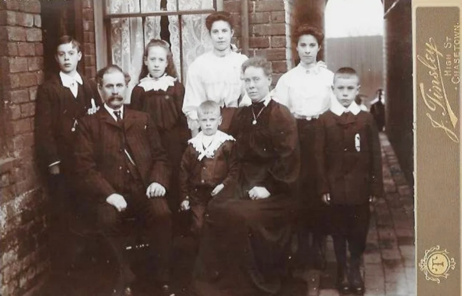 The Daker Family living at 2 New Street, Chasetown. From left to right: Back Row: James, Mary, Maud, Phoebe Front Row: William Jude, Harold, Phoebe Sarah, William