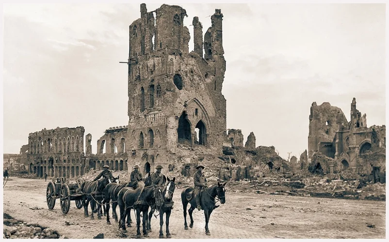 A loaded limber passing the ruins of the Cloth Hall at Ypres, 14 September 1917
