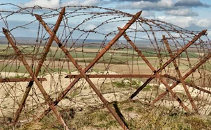 Chevaux de frise {knife-rests as they were known by the British} were barbed wire defences prepared behind the lines and brought forward and put in place at night.
