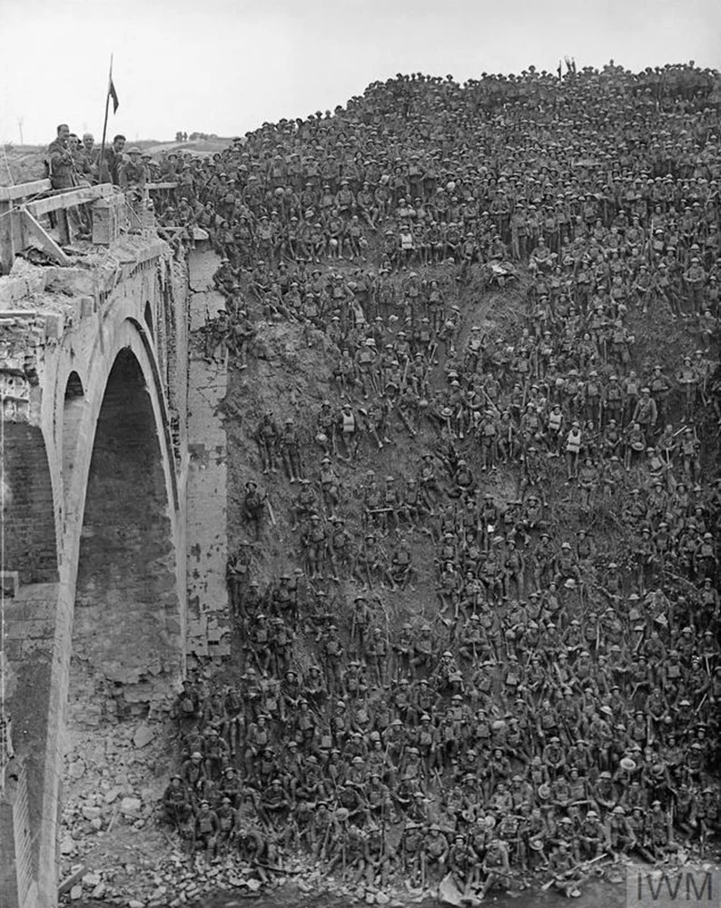 Photograph, taken on 2 October 1918, of Brigadier-General John Vaughan Campbell V.C. on the Riqueval Bridge over the St. Quentin Canal addressing the men of the 137th Brigade (46th Division) who had captured and crossed the Canal on 29 September 1918.