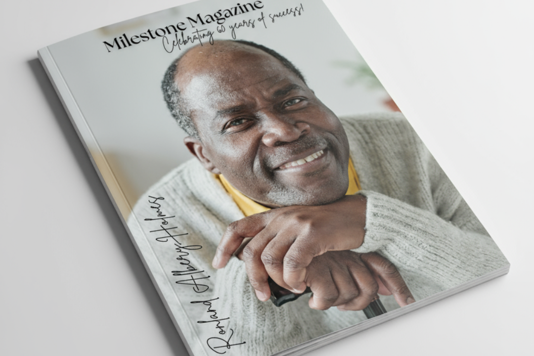 A 60+ male smiling on the cover of a magazine
