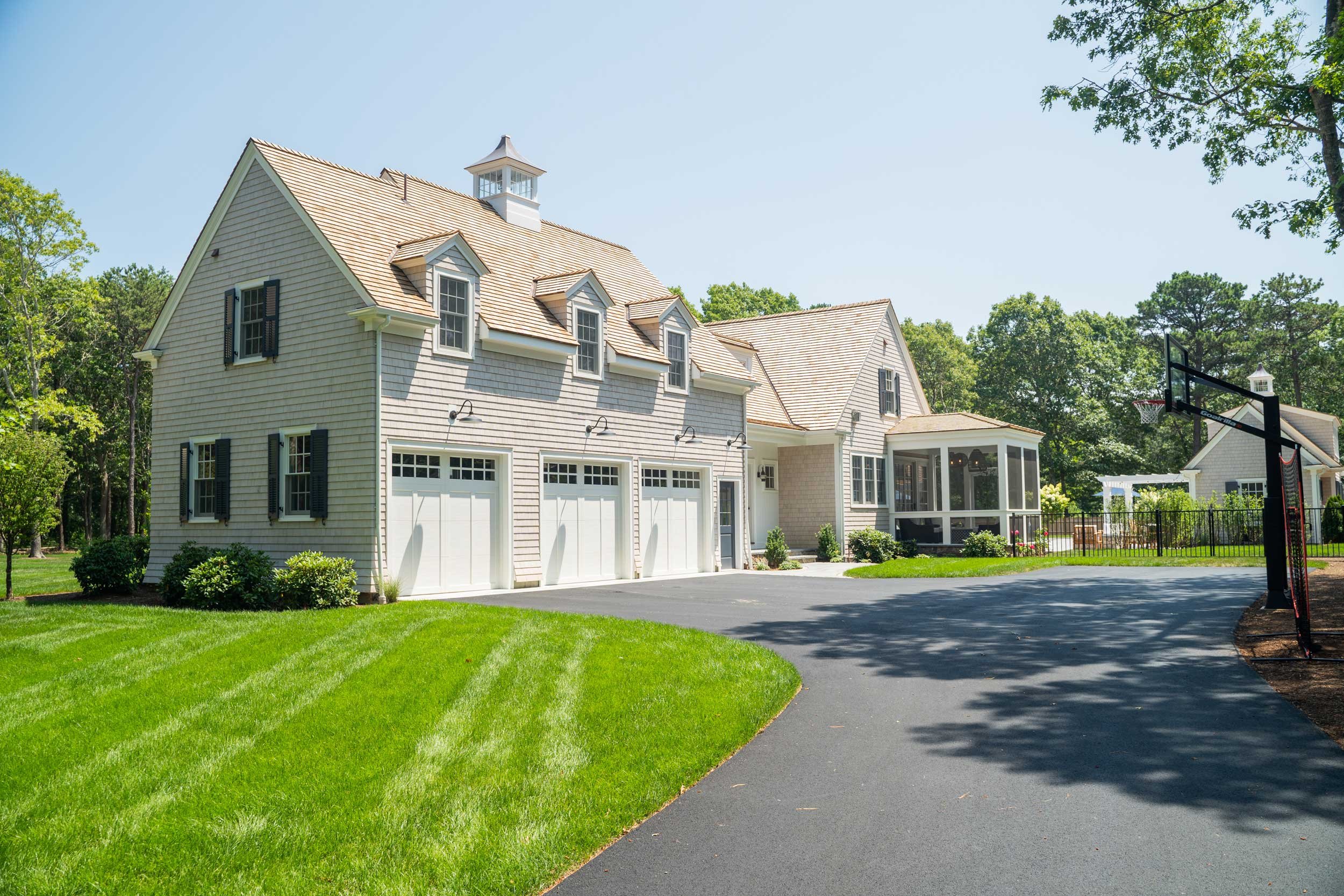 james-golden-oyster-harbors-family-compound-garage-driveway-screened-porch.jpg