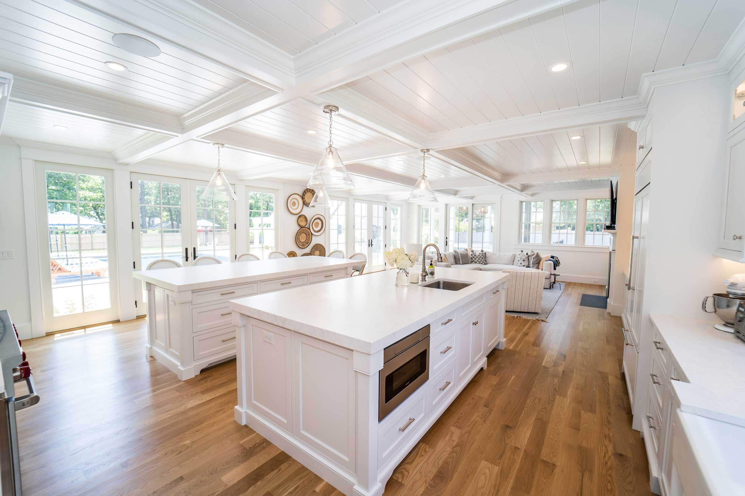 james-golden-oyster-harbors-family-compound-kitchen-great-room-double-island.jpg