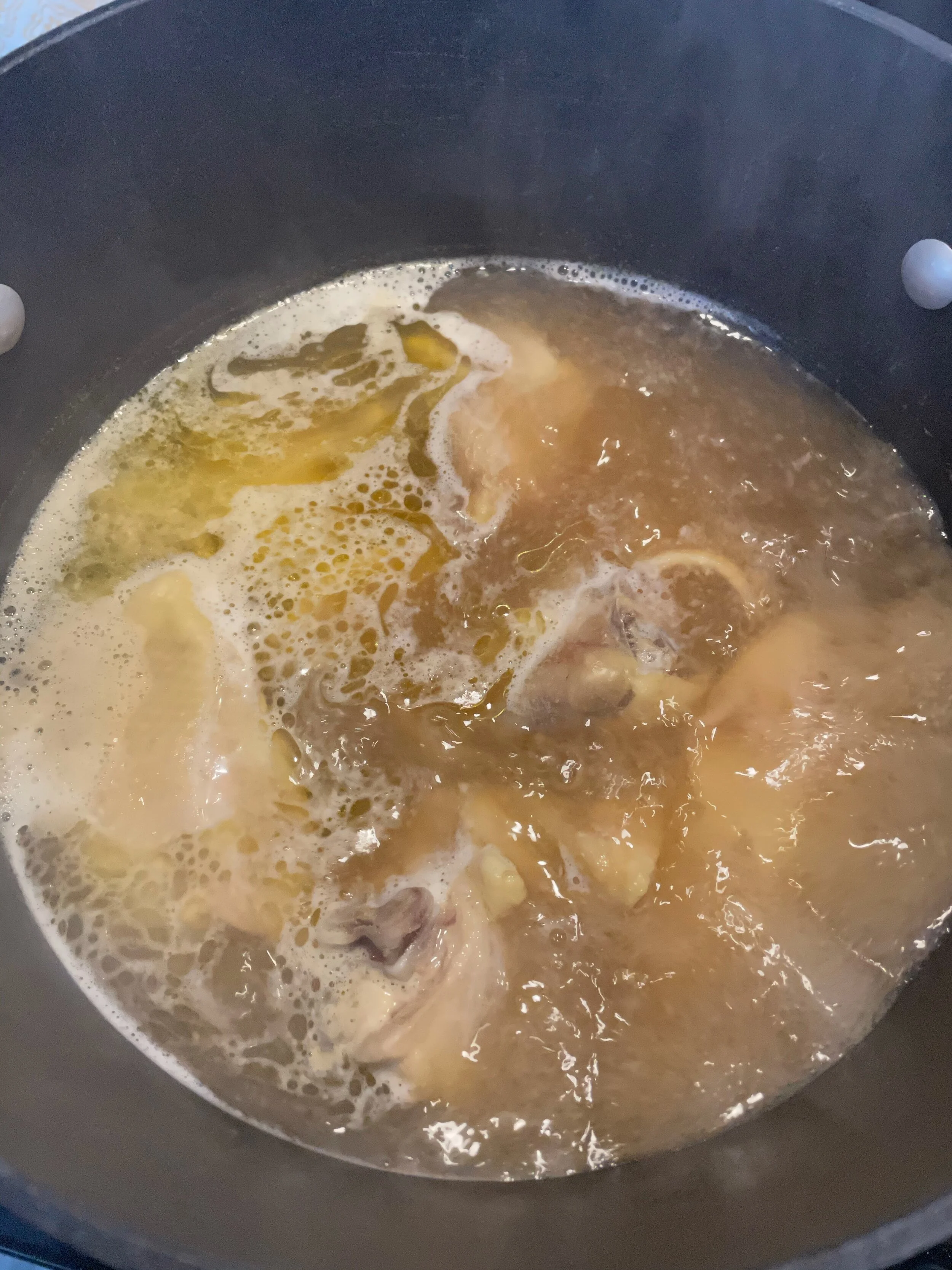 Cooking the chicken thighs in broth