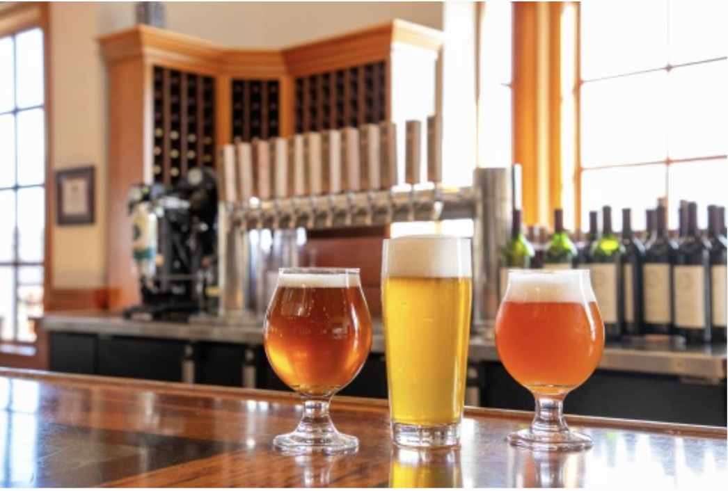 A sampling of beer is lined up on the bar at New Kent Winery and Talleysville Brewing Co. The brewery is co-located at the winery. (Rob Ostermaier/Consociate Media)