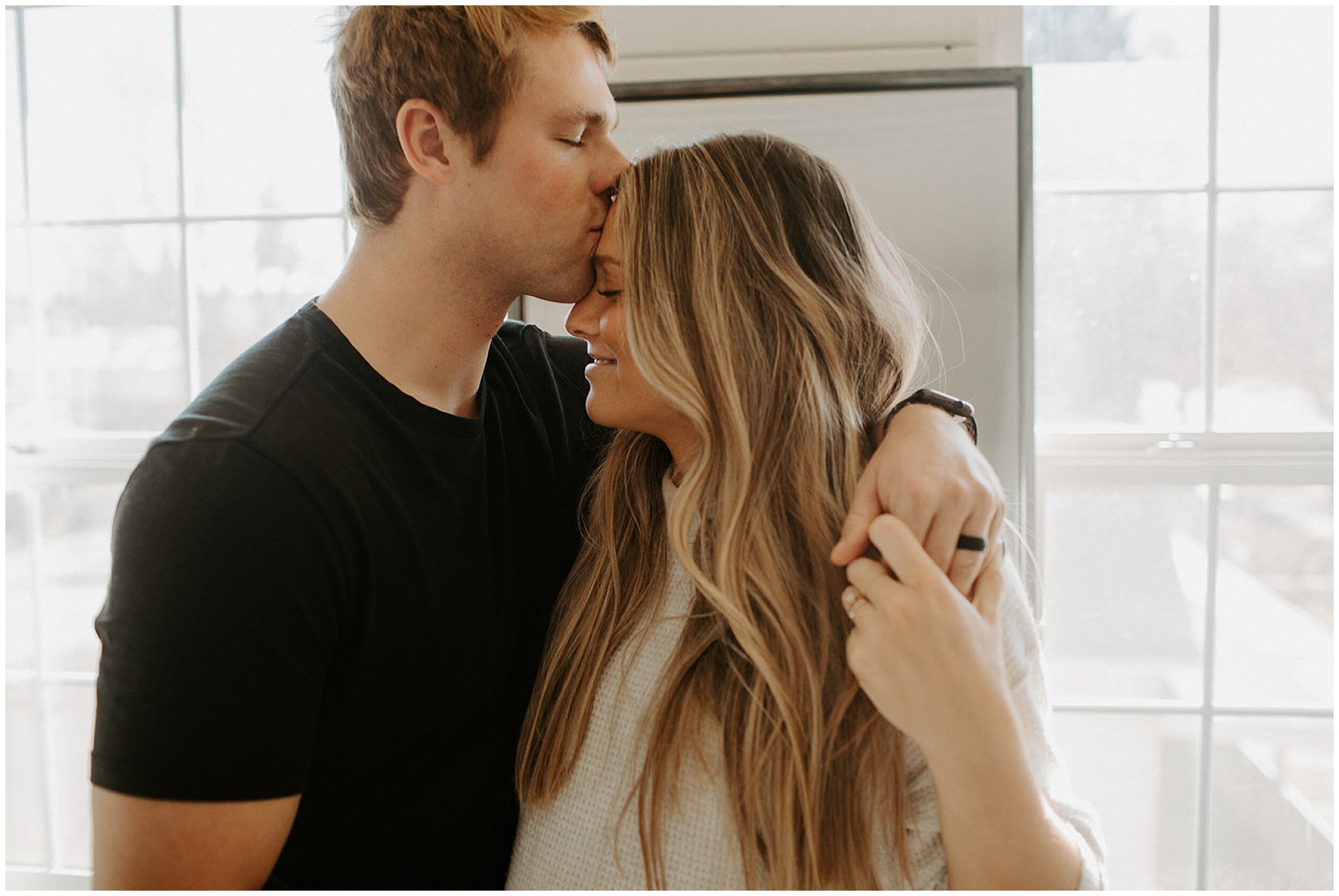 husband kissing wife