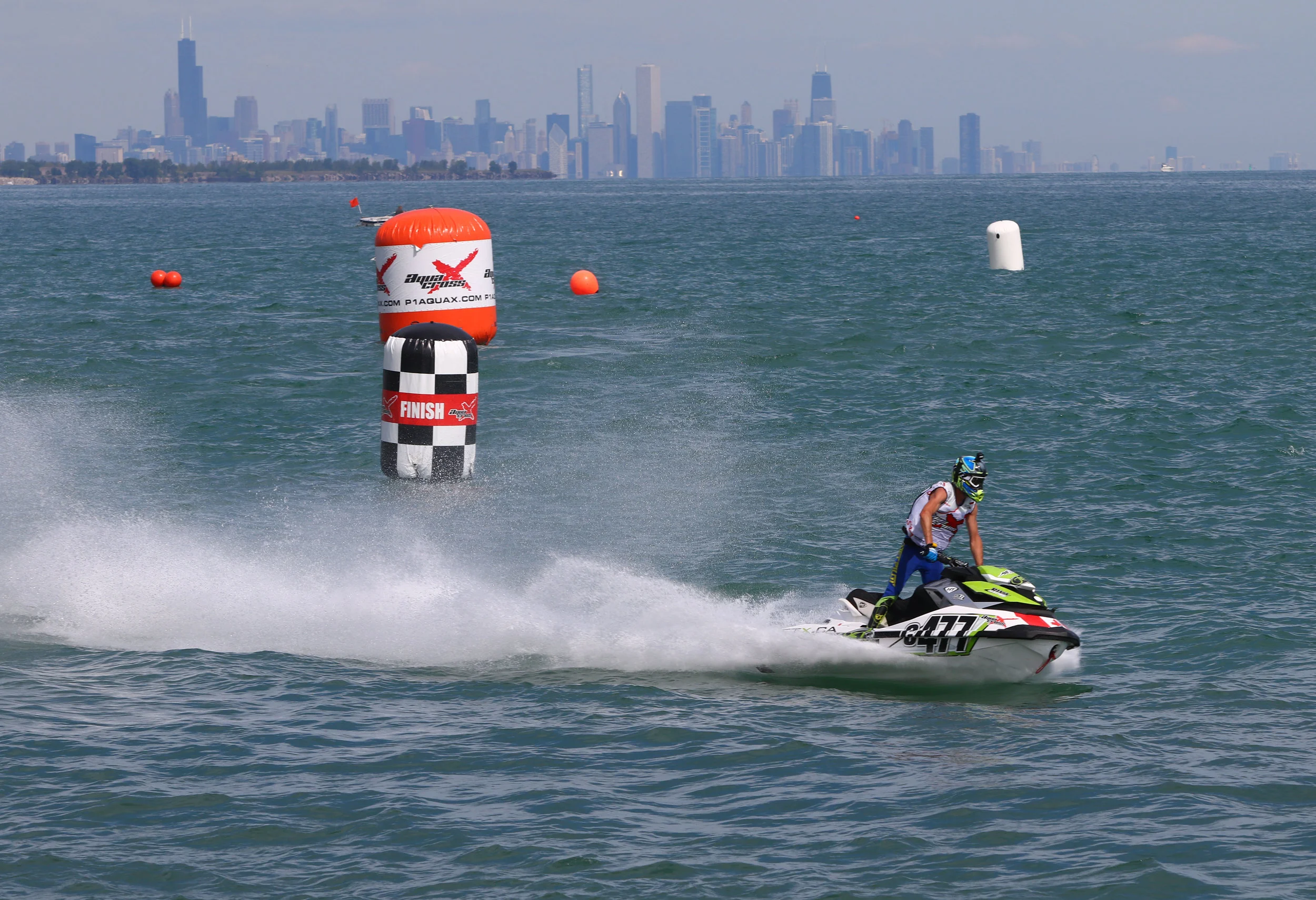 Jay Edworthy, of Cambridge, Ontario, glides past the finish line in race No. 2 of the AquaX Whiting Grand Prix on Aug. 13, 2017.