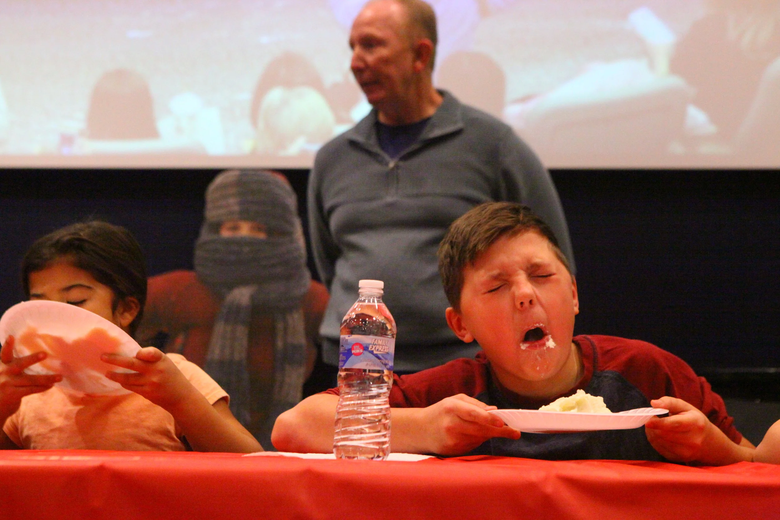 Cavin Porter, of Hammond, struggles for a moment to eat his mashed potatoes in the "Mommy's Little Piggy" eating contest on Dec. 16, 2017 at the Indiana Welcome Center in Hammond.