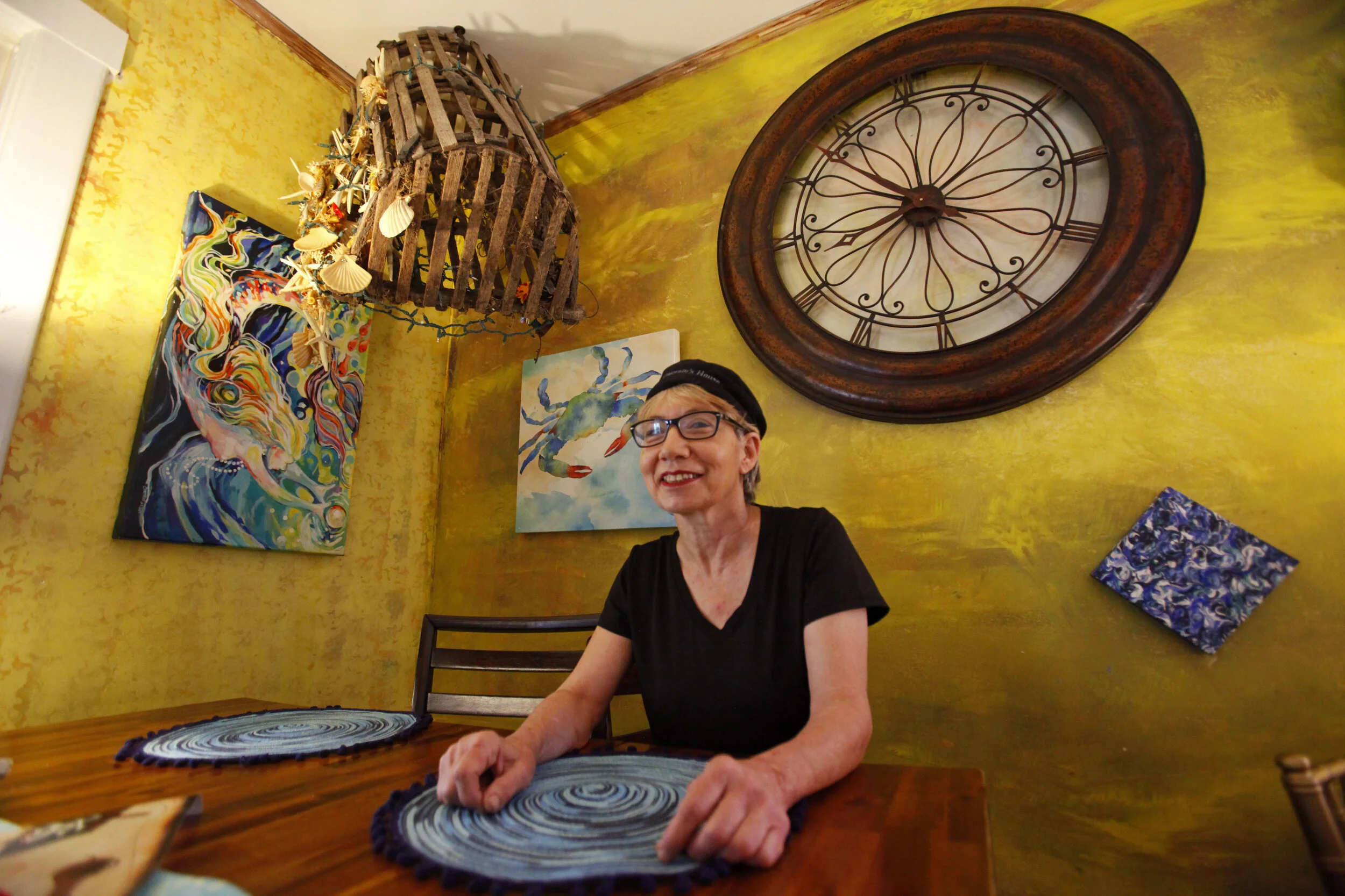 Angela McCrovtiz, head chef of the former Captain’s House restaurant in Gary, poses for a portrait in the ‘captain’s room,’ a portion of the dining area, on August 13, 2019.