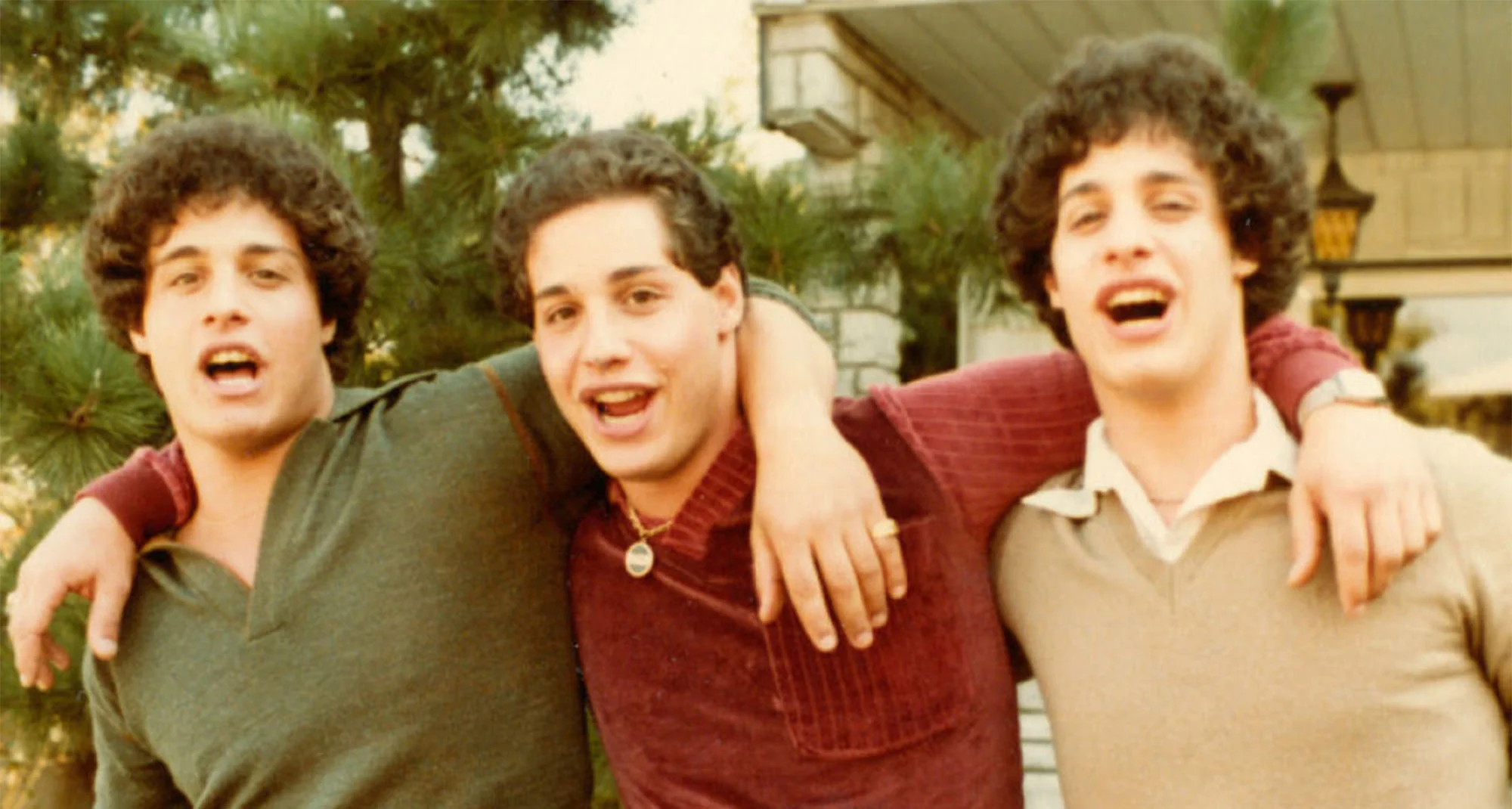 THREE IDENTICAL STRANGERS