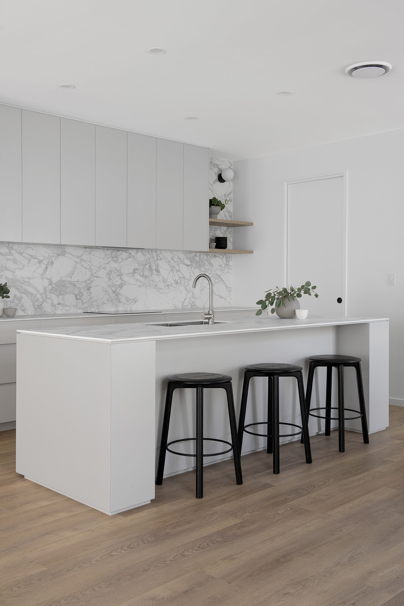 Retreat House Kitchen island bench and engineered timber flooring for kitchen remodel