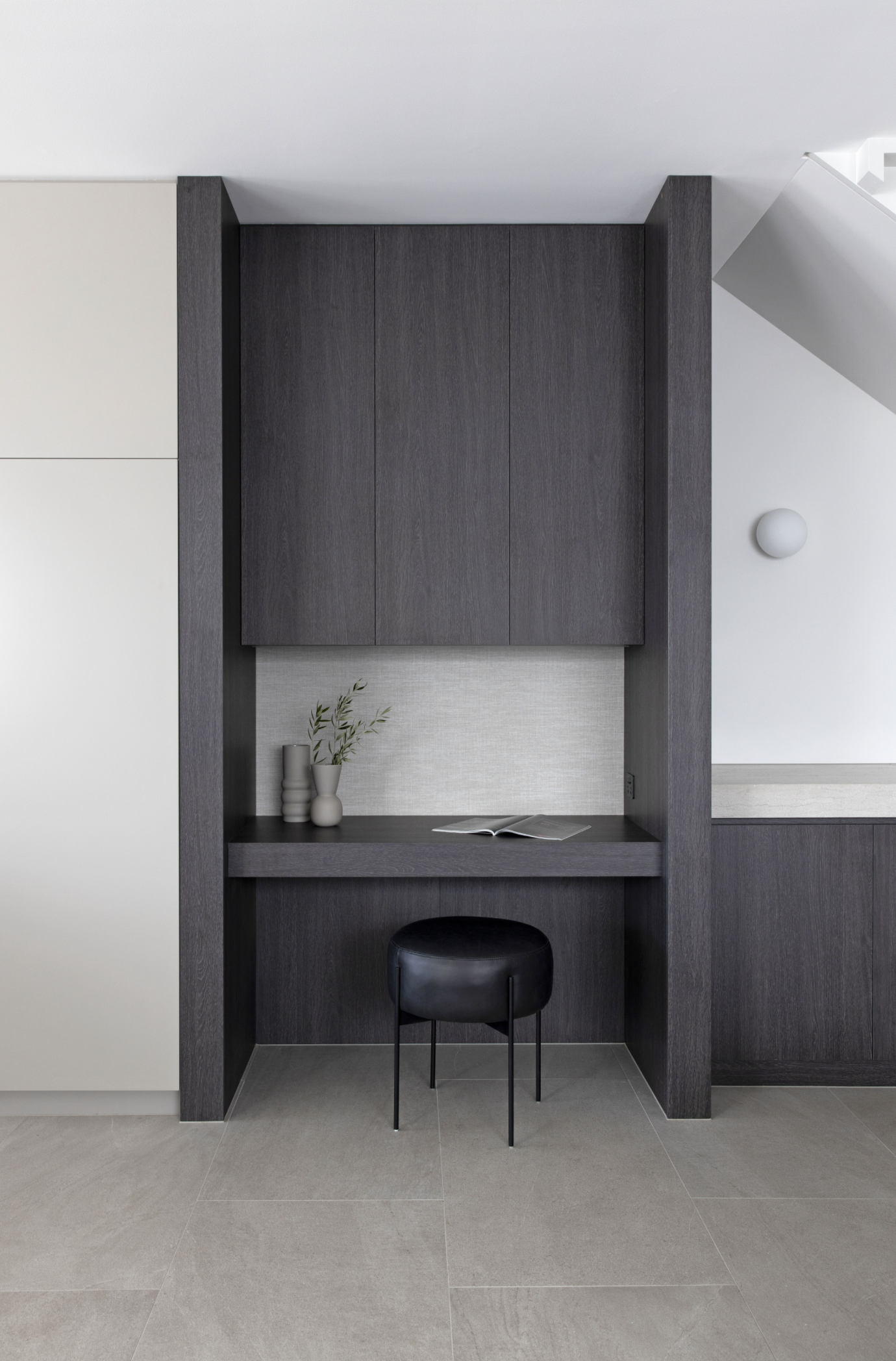 Black timber under stair study nook design with black stool for home remodel