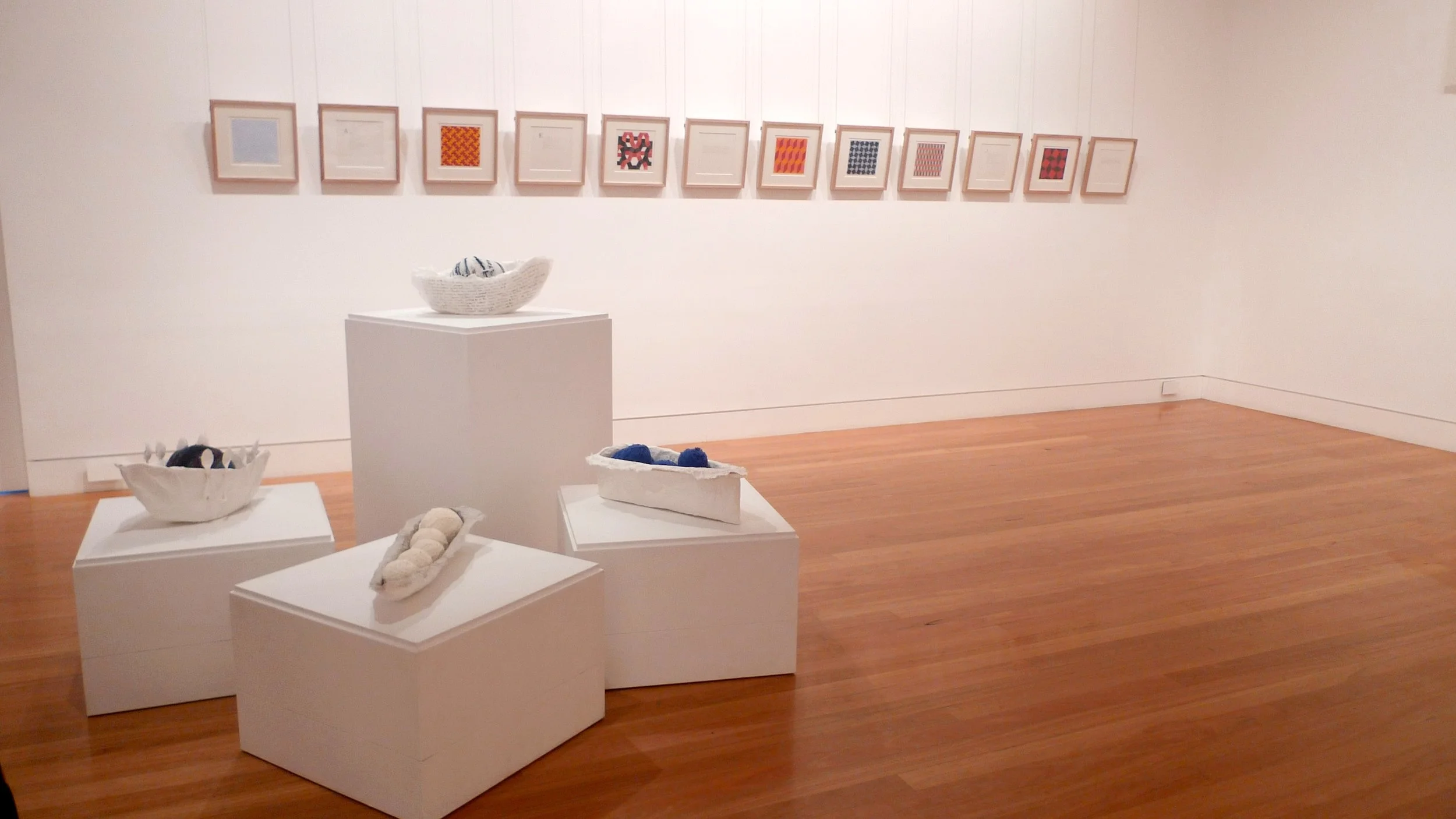  Installation, Coffs Harbour Regional Gallery. 4 hand made paper vessels with unknitted jumpers. 